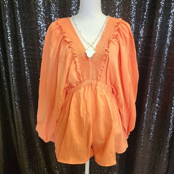 Bucket List Coral Smocked V-Neck Ruffled Solid Woven Romper - Picture 2 of 2